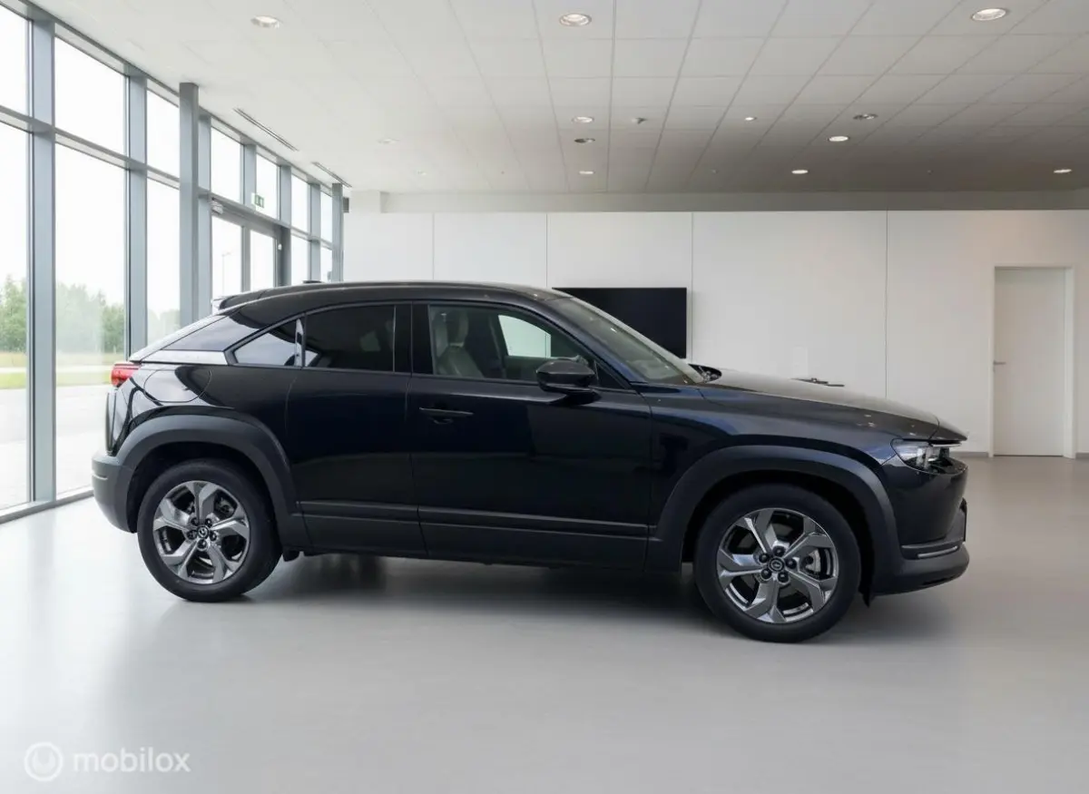 e-SkyActiv 145 | 36 kWh | SOH 91% | Interieurpakket | Half Leder | HUD
