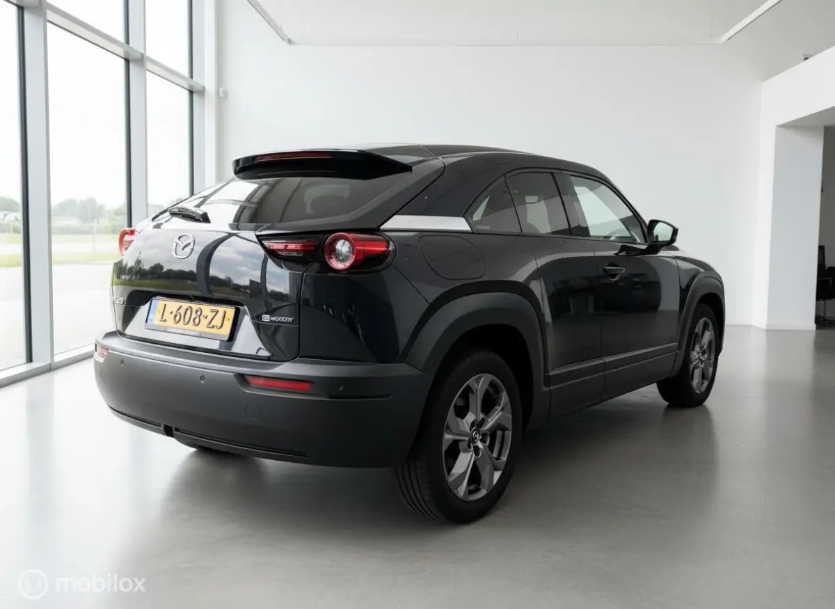 e-SkyActiv 145 | 36 kWh | SOH 91% | Interieurpakket | Half Leder | HUD