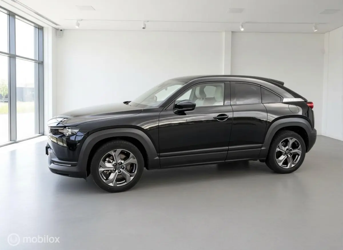 e-SkyActiv 145 | 36 kWh | SOH 91% | Interieurpakket | Half Leder | HUD