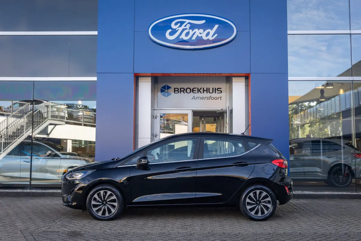 1.0 EcoBoost Hybrid Titanium | Apple Carplay/Android Auto | Keyless | Stoel- Stuurverwarming | | Airco (automatisch) | Apple Carplay/Android Auto|telefoonintegratie premium | Keyless entry