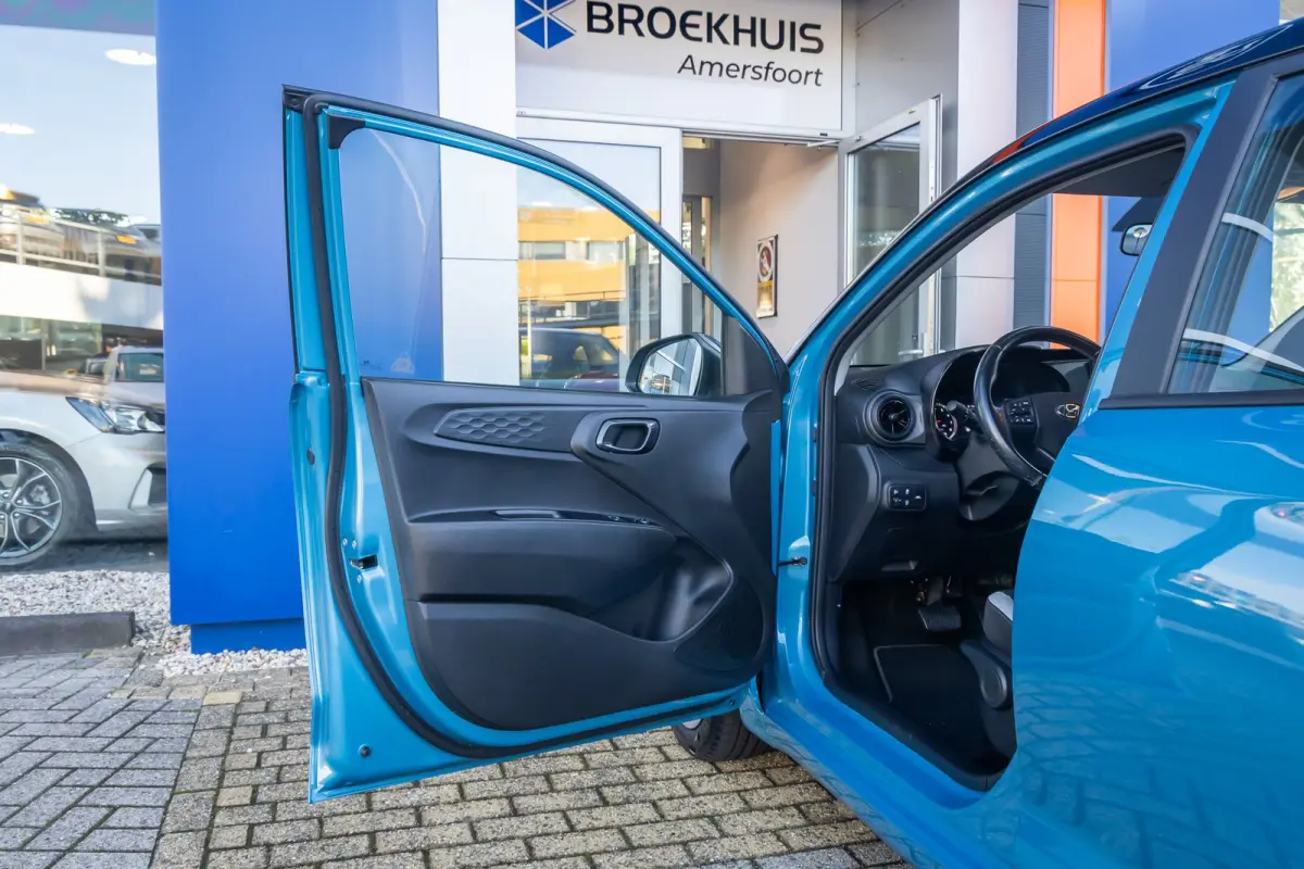1.0 Comfort Smart 5-zits | Apple Carplay/Android Auto | Navigatiesysteem | Cruise control | Afwijkende dakkleur | Airco | Apple Carplay/Android Auto|telefoonintegratie premium