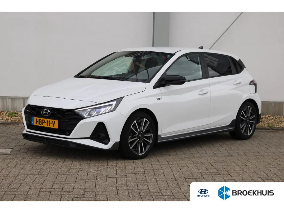 1.0 T-GDI N Line / Navigatie via Carplay / Camera / Stuur -en Stoelverwarmd / Parkeersensoren / LED / ECC / 17'' LMV
