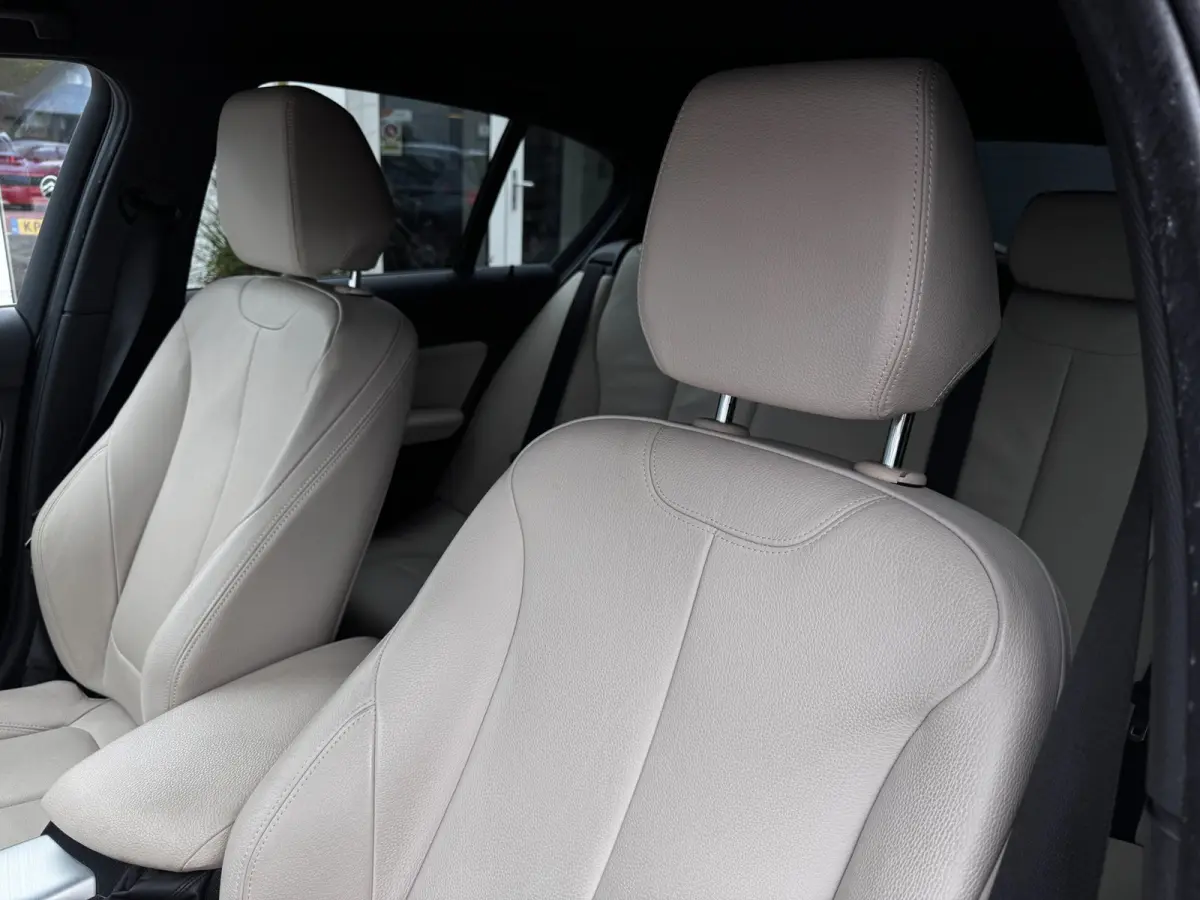 116i Centennial High Executive M-Sport | NL-Auto | BMW Dealer onderhouden | Leder + Stoelverwarming | Trekhaak
