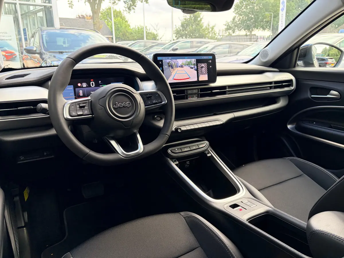 Summit 54 kWh 156 PK | ADAPTIEVE CRUISE CONTROL| SFEERVERLICHTING| DODEHOEK DETECTIE| DRAADLOZE TELEFOONLADER| JEEP PERFORMANCE LED| CAMERA + PARKEERSENSOREN| APPLE CARPLAY/ANDROID AUTO| EER
