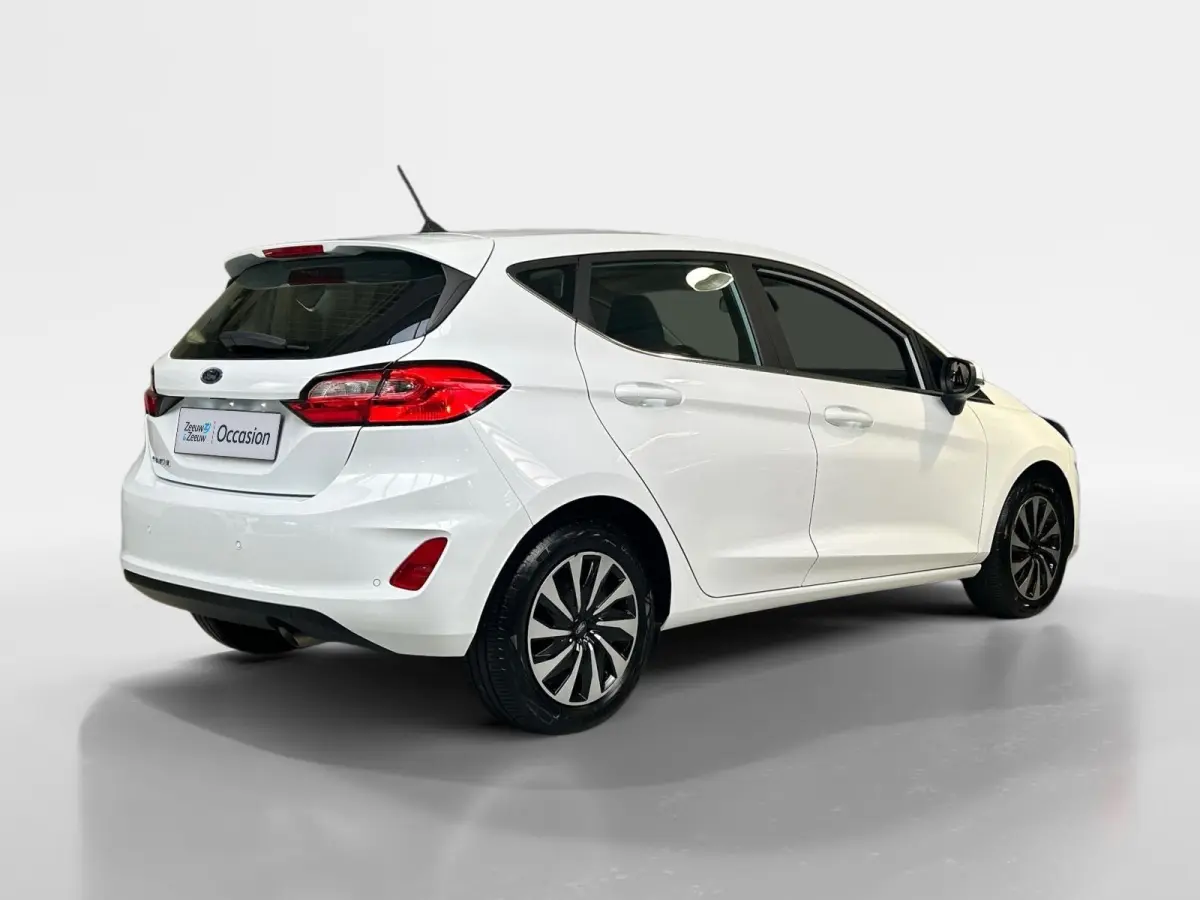 1.0 EcoBoost Hybrid Titanium | Apple Carplay / Android Auto | Stoel + Stuurverwarming | Cruise Control | Parkeersensoren Achter | Lichtsensor | Climate Control | Verwarmbare Voorruit