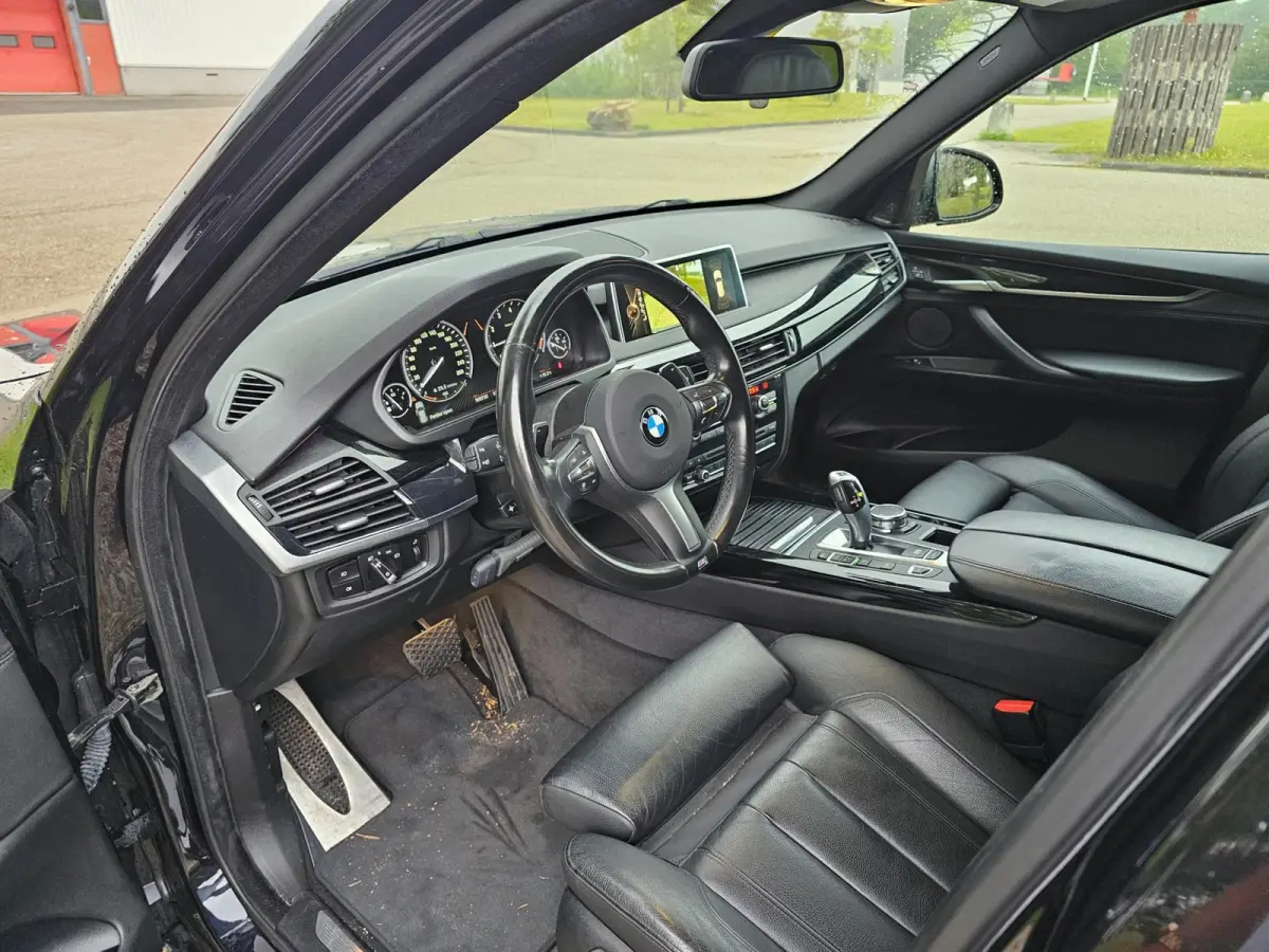 XDrive40e High Executive M-sport dealer onderhouden