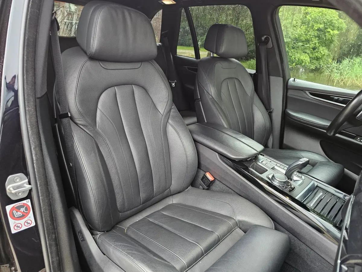 XDrive40e High Executive M-sport dealer onderhouden