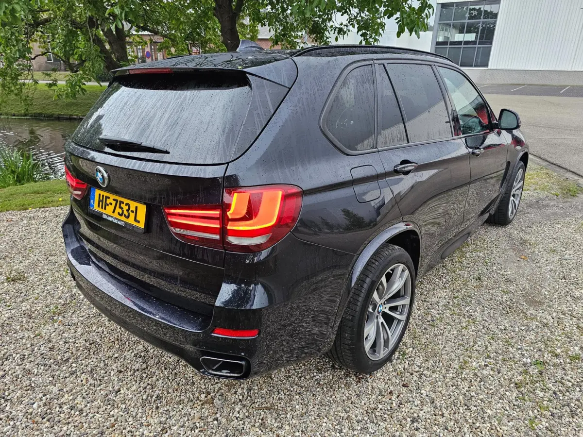 XDrive40e High Executive M-sport dealer onderhouden