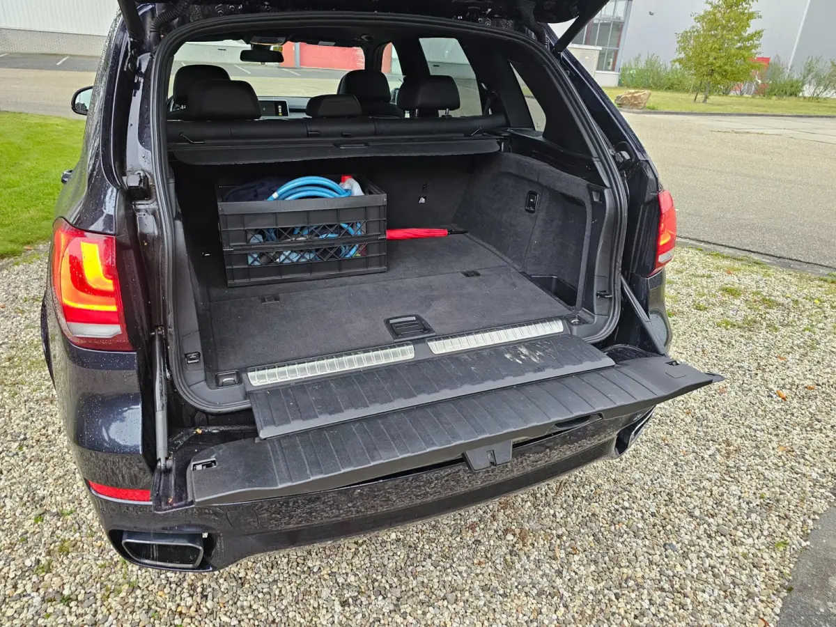 XDrive40e High Executive M-sport dealer onderhouden