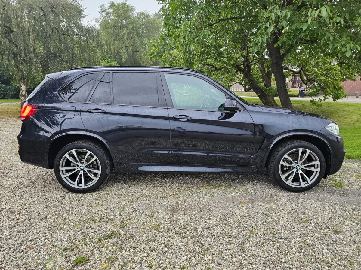 XDrive40e High Executive M-sport dealer onderhouden