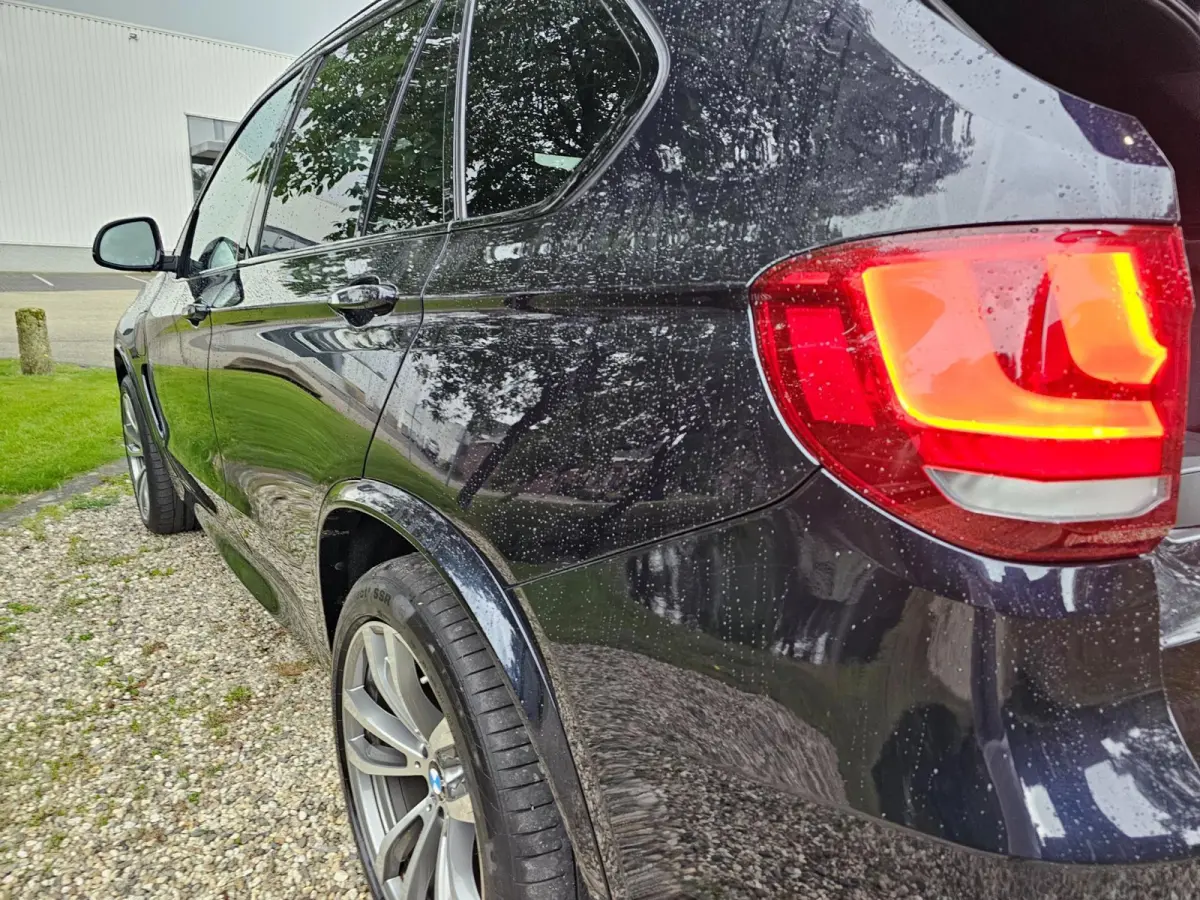 XDrive40e High Executive M-sport dealer onderhouden