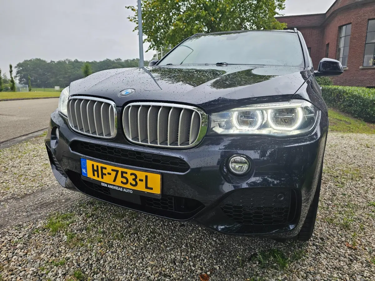 XDrive40e High Executive M-sport dealer onderhouden