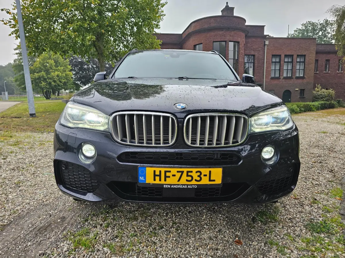 XDrive40e High Executive M-sport dealer onderhouden