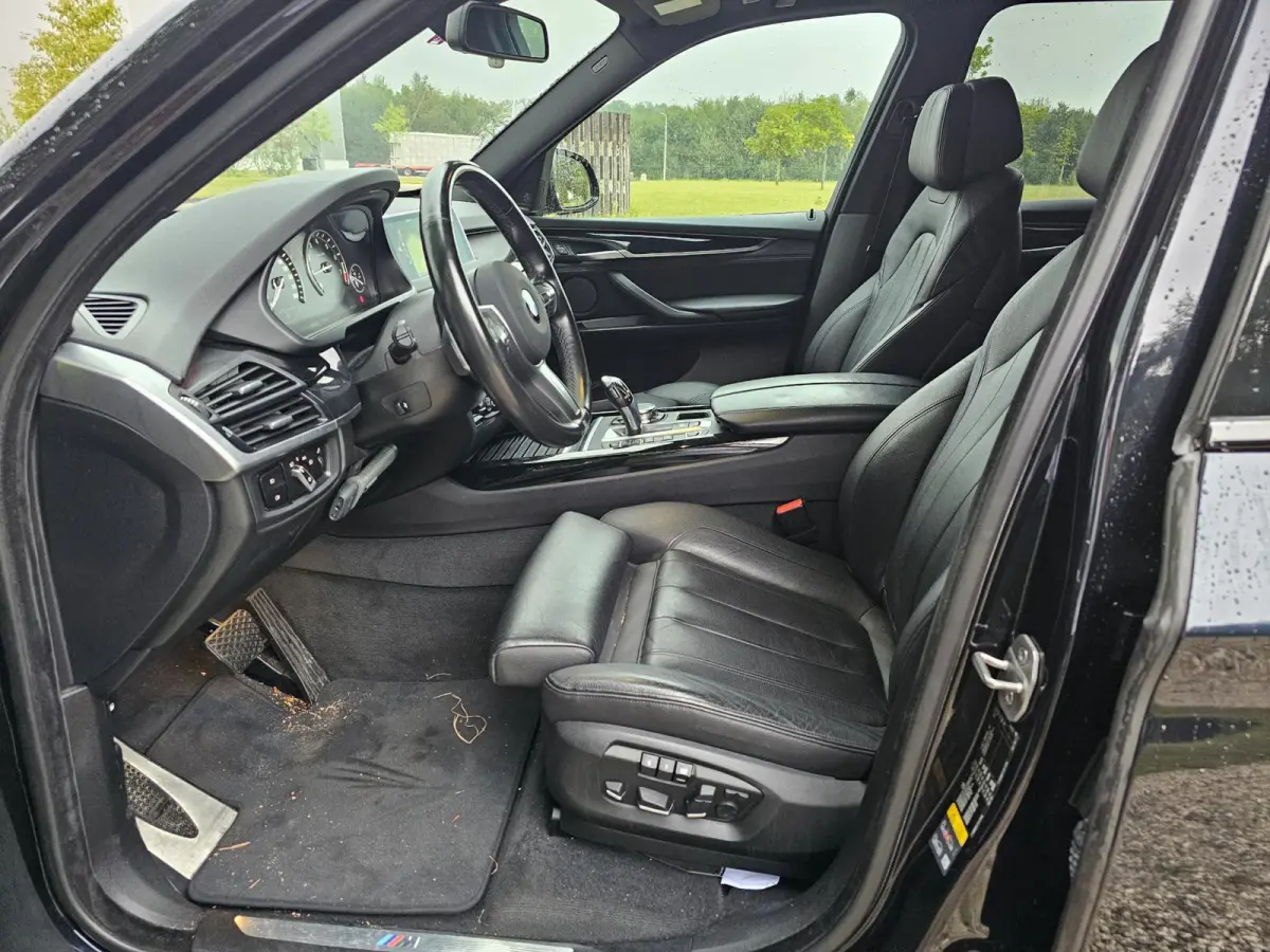 XDrive40e High Executive M-sport dealer onderhouden