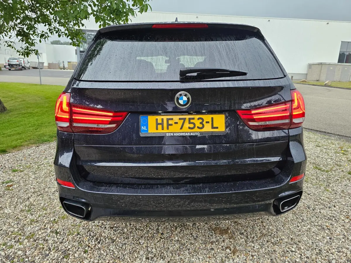 XDrive40e High Executive M-sport dealer onderhouden