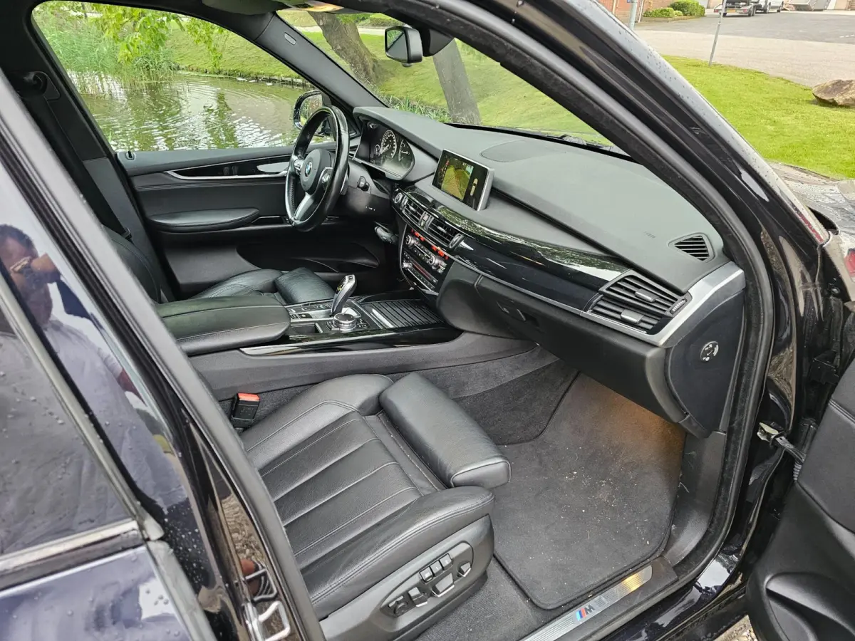 XDrive40e High Executive M-sport dealer onderhouden