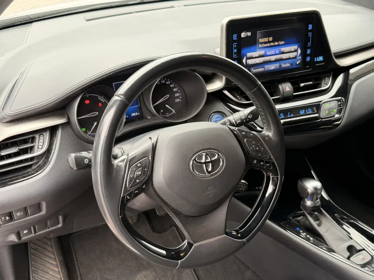 1.8 Hybrid Dynamic | LED | Trekhaak | Camera | Stoelverwarming | All-seasons | Navi | Keyless |