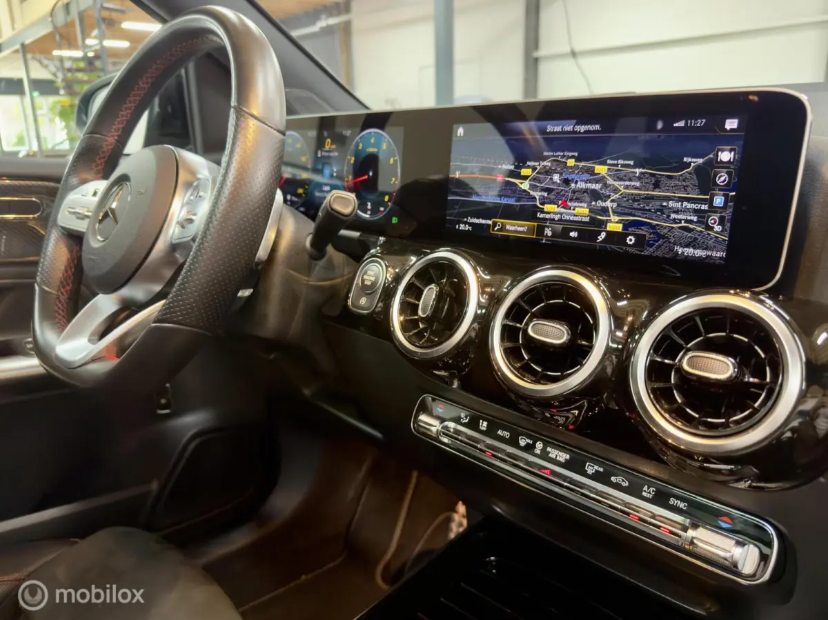 180 Business Solution AMG | Pano | Camera | Stoelverwarming | NAP | Elektrische achterklep | Widescreen | Spoor- & Remassistent | DYNAMIC