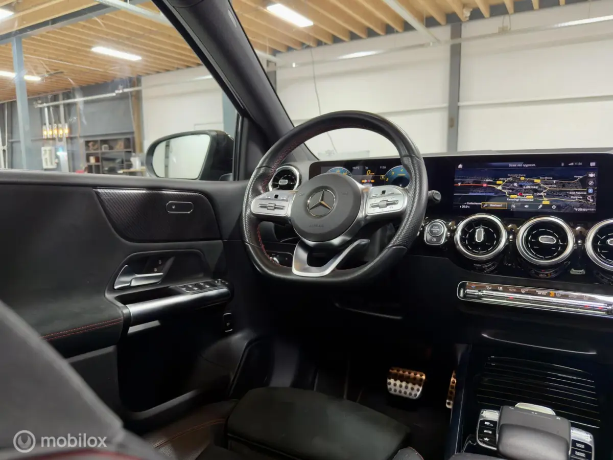180 Business Solution AMG | Pano | Camera | Stoelverwarming | NAP | Elektrische achterklep | Widescreen | Spoor- & Remassistent | DYNAMIC