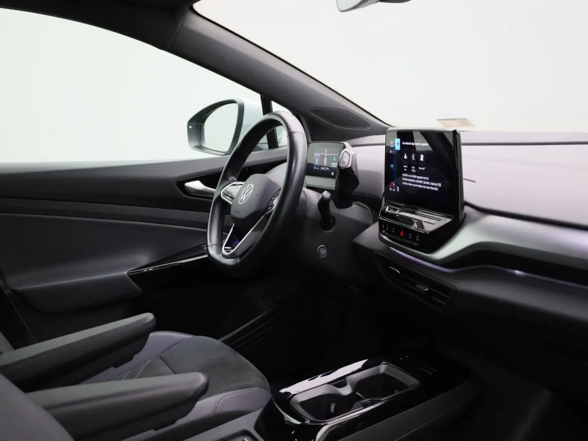 Pro 77 kWh 204 PK| GERESERVEERD | Dealeronderhouden | Navigatie | Stoelverwarming | Stuurwielverwarming | Achteruitrijcamera | Parkeersensoren | Keyless Access