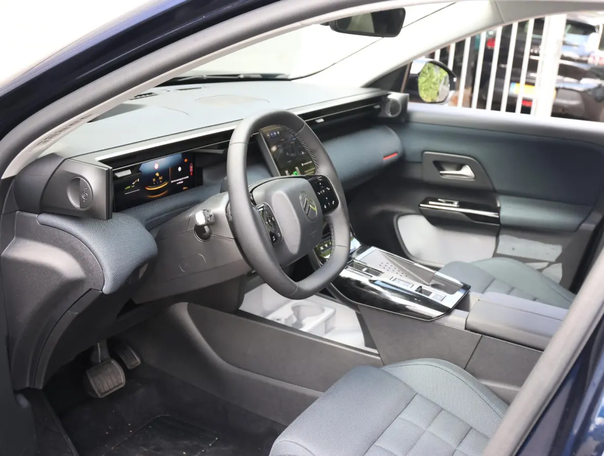 Plus Comfort Range 74 kWh | Accutest 98% | Head-up display | Camera | Elektrisch bedienbare achterklep