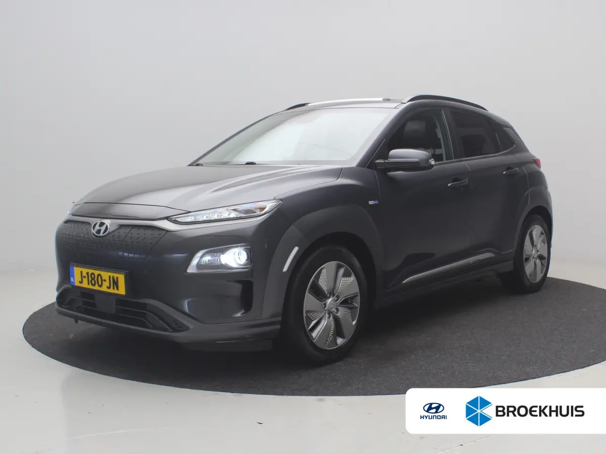EV Premium 64 kWh / Navigatie/ Warmtepomp / 3-Fase / Lederen bekleding / SoH 99,4% / Trekhaak / Lederen bekleding / 481 km WLTP/