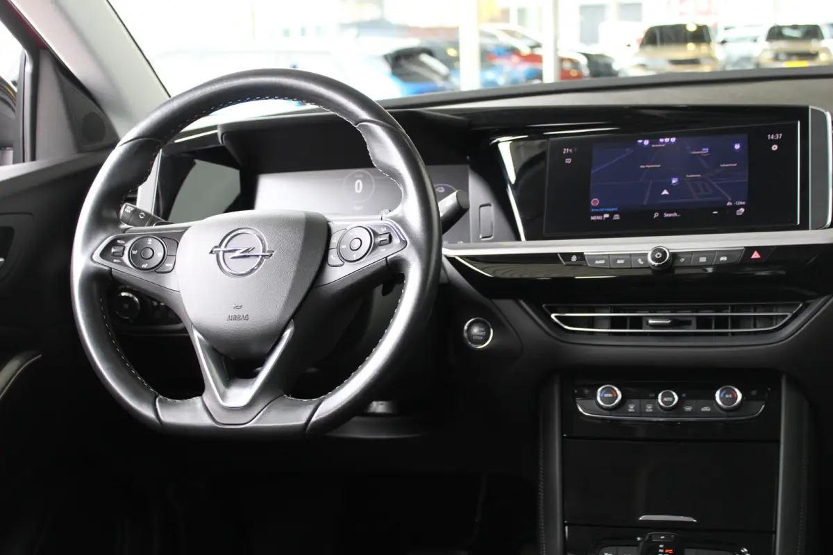 1.6 Turbo Hybrid Elegance | Alcantara bekleding | Afneembare trekhaak | Adaptieve cruise control |