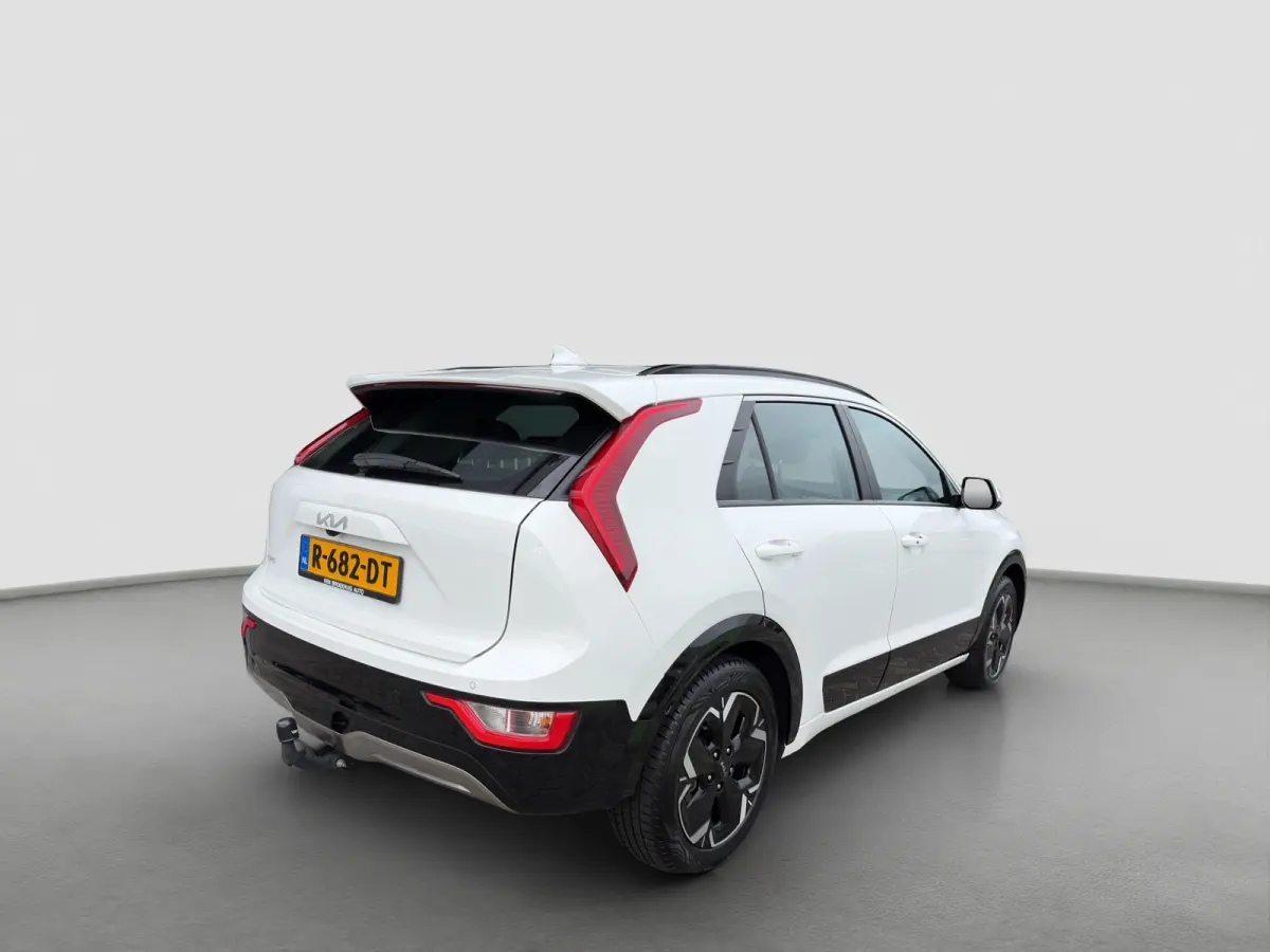 DynamicLine 64.8 kWh 204pk | SOH 100% | Carplay | Camera | Trekhaak | Halfleder | Adaptive Cruise | DAB | Navigatie | Keyless entry | Climate control | Regensensor