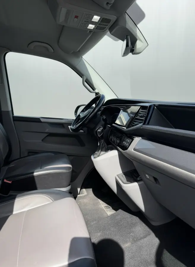 2.0 TDI L2H1 30 DC Caravelle Virtual, Adaptieve Cruise, Camera, 2 x Electrische deur, 199pk, LED, Leder, Clima, Stoelverwarming, Carplay, Automaat, Uniek!