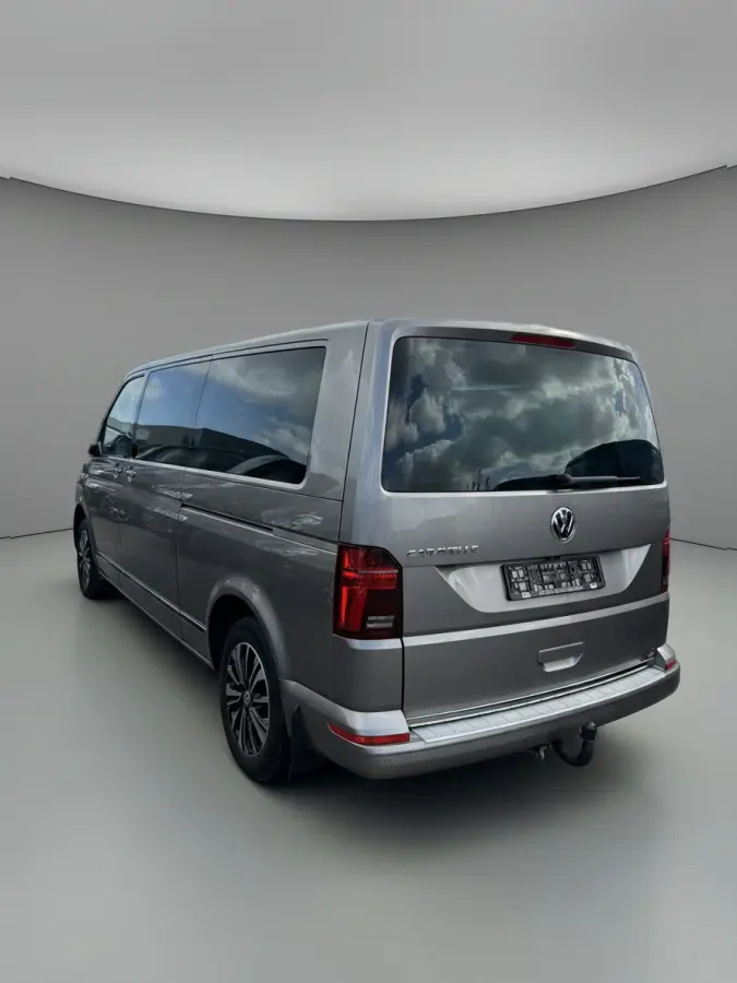 2.0 TDI L2H1 30 DC Caravelle Virtual, Adaptieve Cruise, Camera, 2 x Electrische deur, 199pk, LED, Leder, Clima, Stoelverwarming, Carplay, Automaat, Uniek!