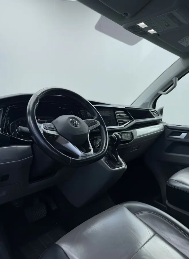 2.0 TDI L2H1 30 DC Caravelle Virtual, Adaptieve Cruise, Camera, 2 x Electrische deur, 199pk, LED, Leder, Clima, Stoelverwarming, Carplay, Automaat, Uniek!