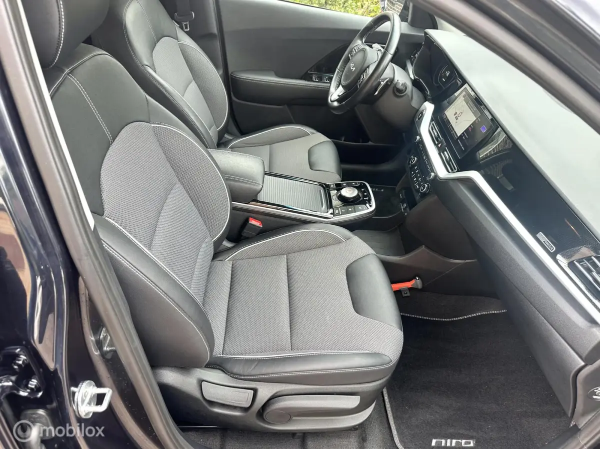 DynamicLine 64 kWhv 3-FASE LADEN SOH 100% CARPLAY ACHTERUITRIJ CAMERA STOEL/STUURVERWARMING NETTE AUTO!!