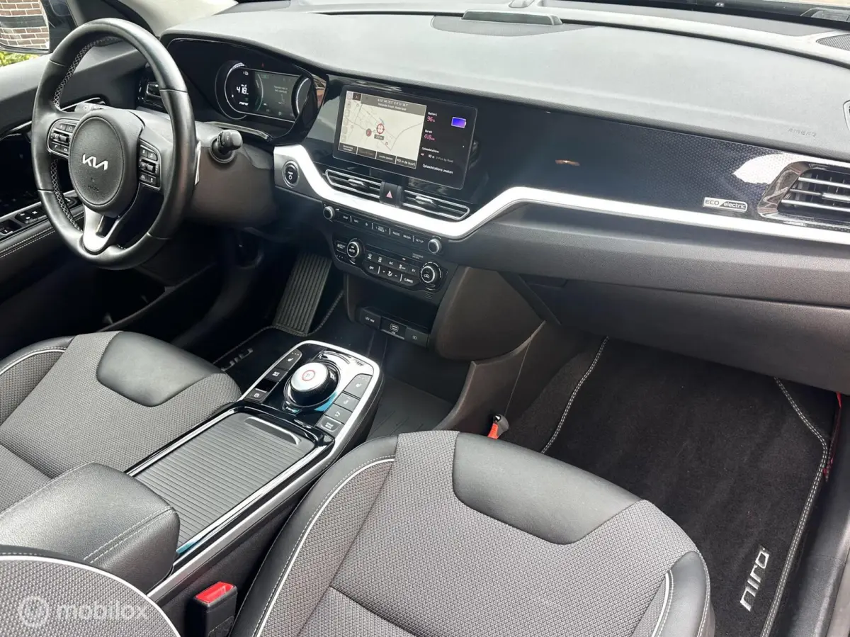 DynamicLine 64 kWhv 3-FASE LADEN SOH 100% CARPLAY ACHTERUITRIJ CAMERA STOEL/STUURVERWARMING NETTE AUTO!!