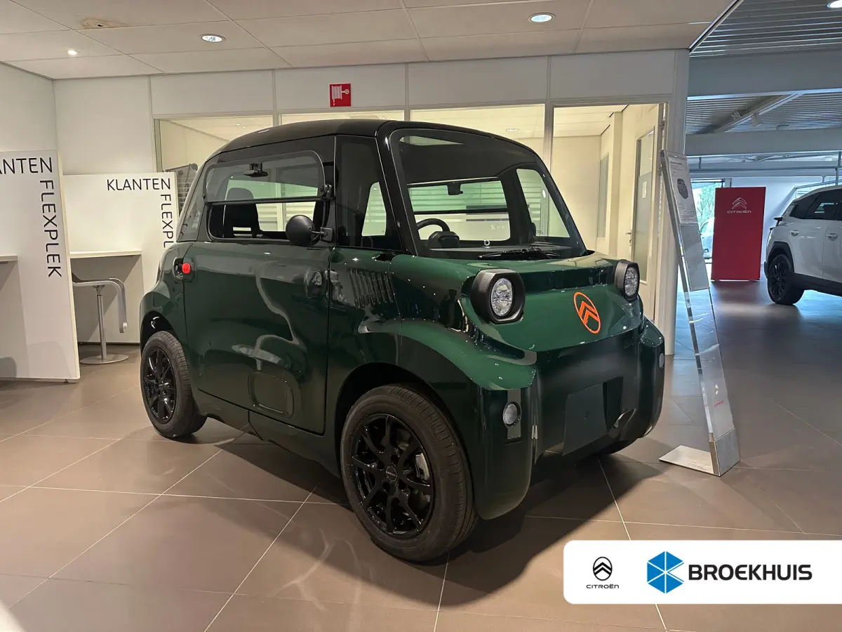 Brommobiel AMI Unieke kleur: British Racing Green | Lichtmetalen velgen | Panoramadak | | Kunstlederen bekleding | LED achterlichten | LED koplampen