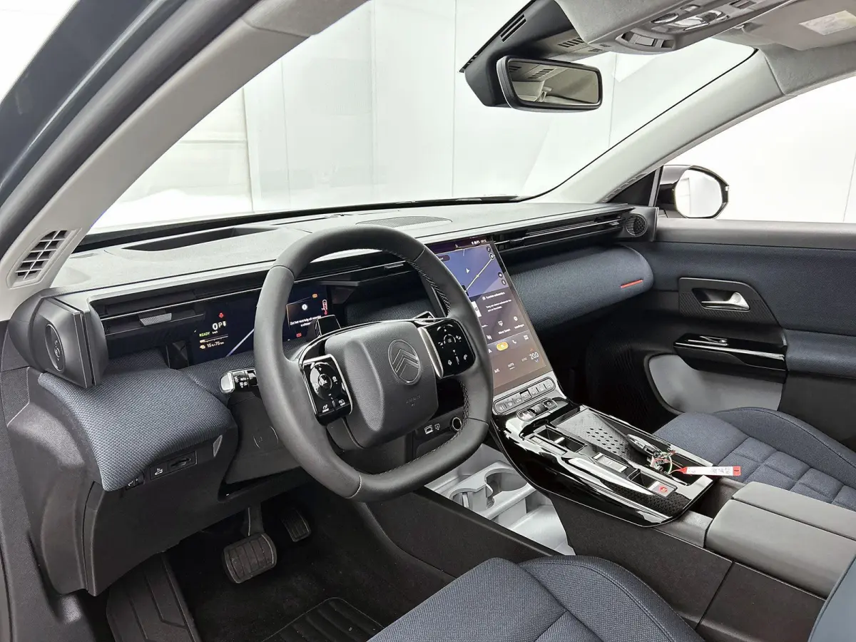 Plus Comfort Range 74 kWh | Navigatie | Accu 99% | Handsfree Kofferklep | Apple Carplay/Android Auto | Dodehoek Bewaking | Adaptieve Cruise Control | Head-Up Display |