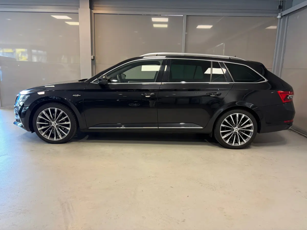 Laurin & Klement 1.4 TSI iV PHEV | Panoramadak | Trekhaak | Leder | Canton |