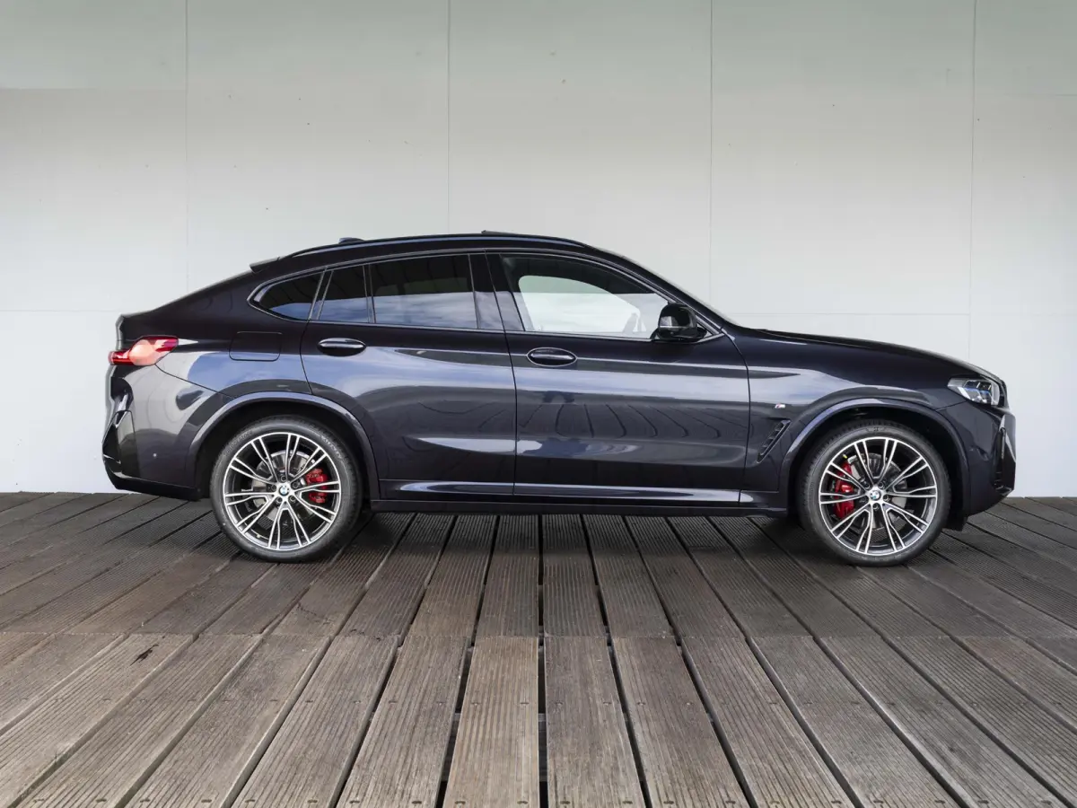 M40i | High Executive | M Sport Plus Pack | Macaoblauw | Stuurwielrand verwarmd | Comfort Access | Panoramadak | Head-Up Display | Harman Kardon | 21''