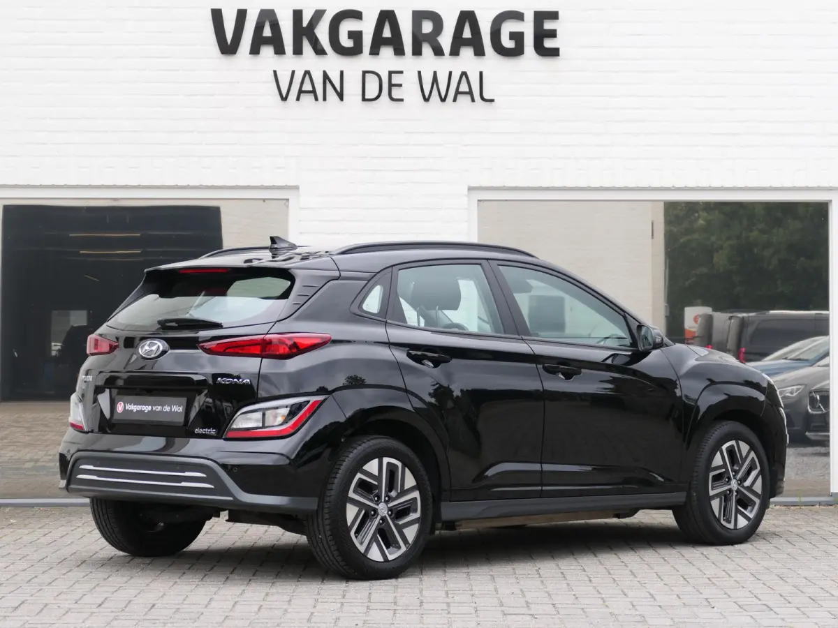 EV Comfort 64 kWh | Apple-/Android Carplay | Achteruitrijcamera | Digitaal dashboard | Stuur-/Stoelverwarming | Climate Control | ACC | 1e eigenaar | Dealer onderhouden