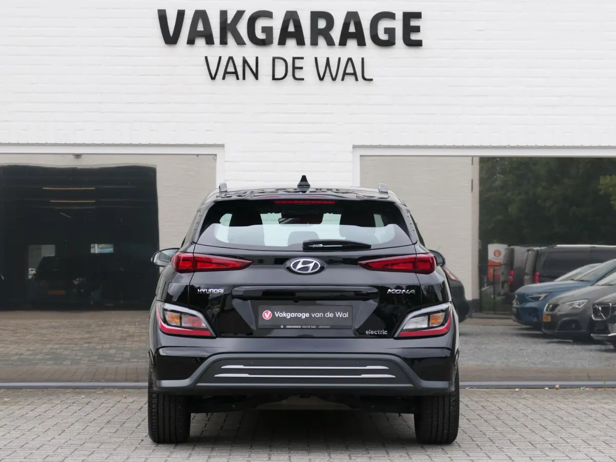 EV Comfort 64 kWh | Apple-/Android Carplay | Achteruitrijcamera | Digitaal dashboard | Stuur-/Stoelverwarming | Climate Control | ACC | 1e eigenaar | Dealer onderhouden