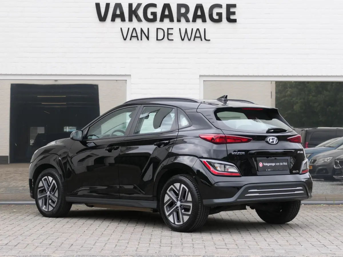 EV Comfort 64 kWh | Apple-/Android Carplay | Achteruitrijcamera | Digitaal dashboard | Stuur-/Stoelverwarming | Climate Control | ACC | 1e eigenaar | Dealer onderhouden