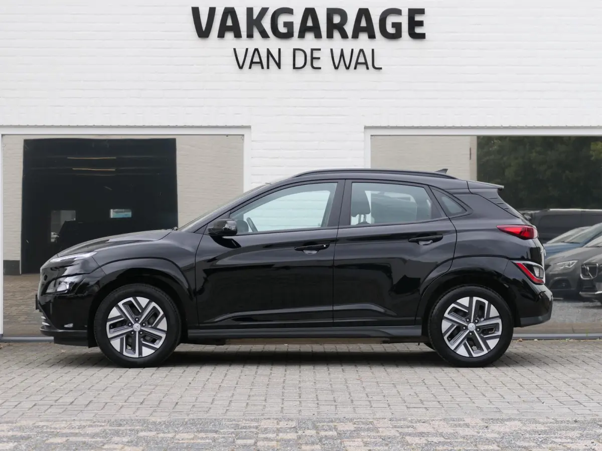 EV Comfort 64 kWh | Apple-/Android Carplay | Achteruitrijcamera | Digitaal dashboard | Stuur-/Stoelverwarming | Climate Control | ACC | 1e eigenaar | Dealer onderhouden