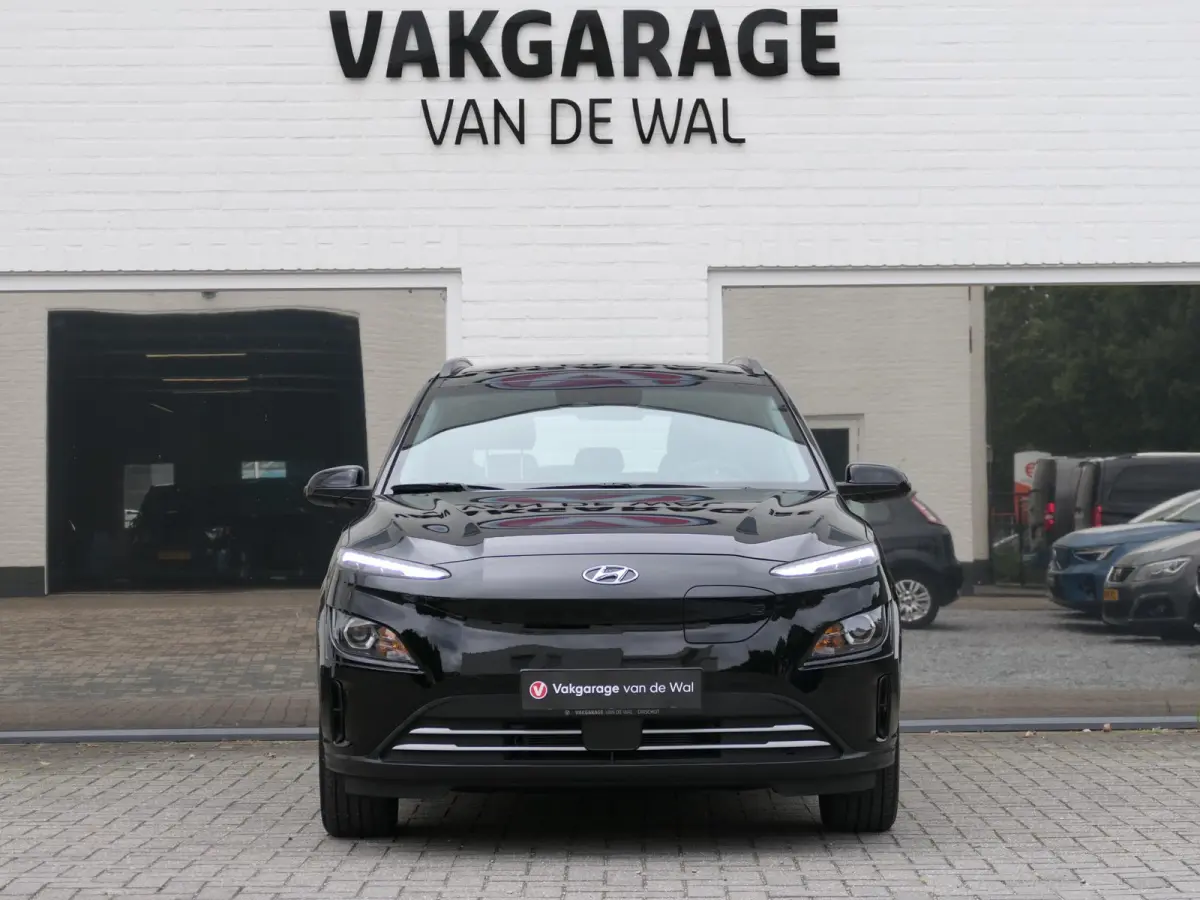 EV Comfort 64 kWh | Apple-/Android Carplay | Achteruitrijcamera | Digitaal dashboard | Stuur-/Stoelverwarming | Climate Control | ACC | 1e eigenaar | Dealer onderhouden