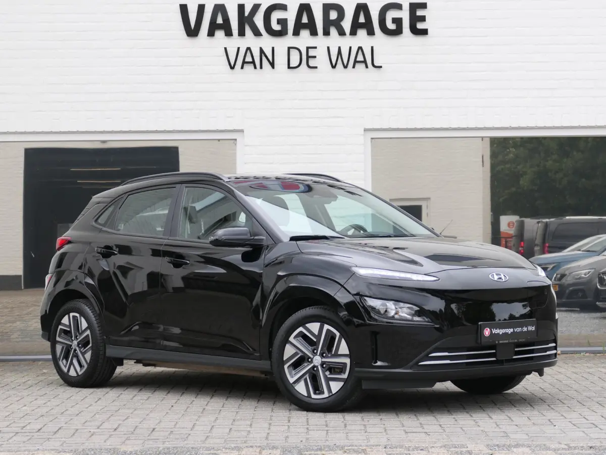 EV Comfort 64 kWh | Apple-/Android Carplay | Achteruitrijcamera | Digitaal dashboard | Stuur-/Stoelverwarming | Climate Control | ACC | 1e eigenaar | Dealer onderhouden