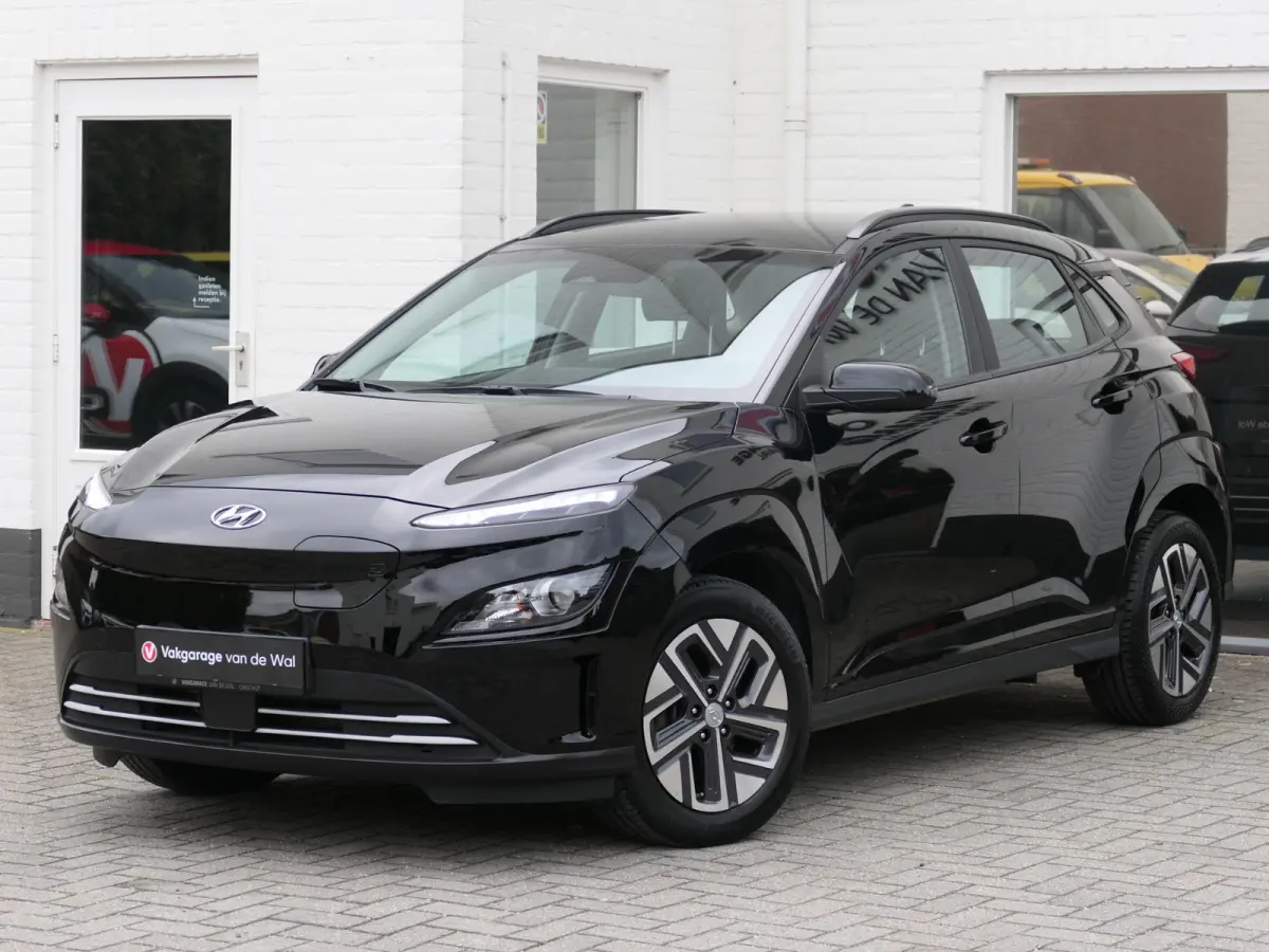 EV Comfort 64 kWh | Apple-/Android Carplay | Achteruitrijcamera | Digitaal dashboard | Stuur-/Stoelverwarming | Climate Control | ACC | 1e eigenaar | Dealer onderhouden
