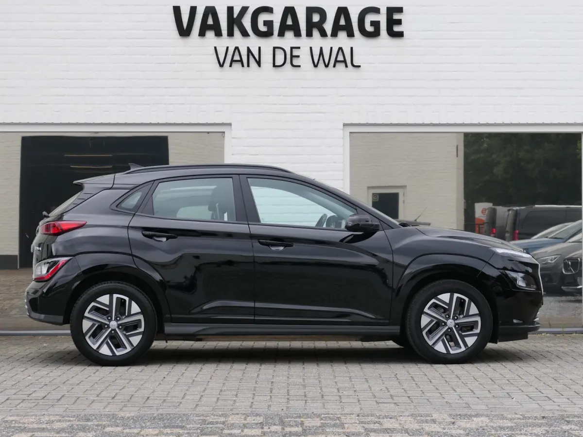 EV Comfort 64 kWh | Apple-/Android Carplay | Achteruitrijcamera | Digitaal dashboard | Stuur-/Stoelverwarming | Climate Control | ACC | 1e eigenaar | Dealer onderhouden