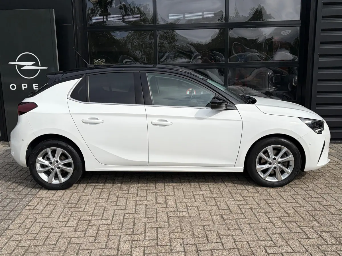 1.2 100 PK Elegance | STUUR EN STOELVERWARMING| DODEHOEK DETECTIE| KEYLESS ENTRY & START| NAVIGATIE + APPLE CARPLAY/ANDROID AUTO| CAMERA + PARKEERSENSOREN| FULL LED| EERSTE EIGENAAR| DEALER 
