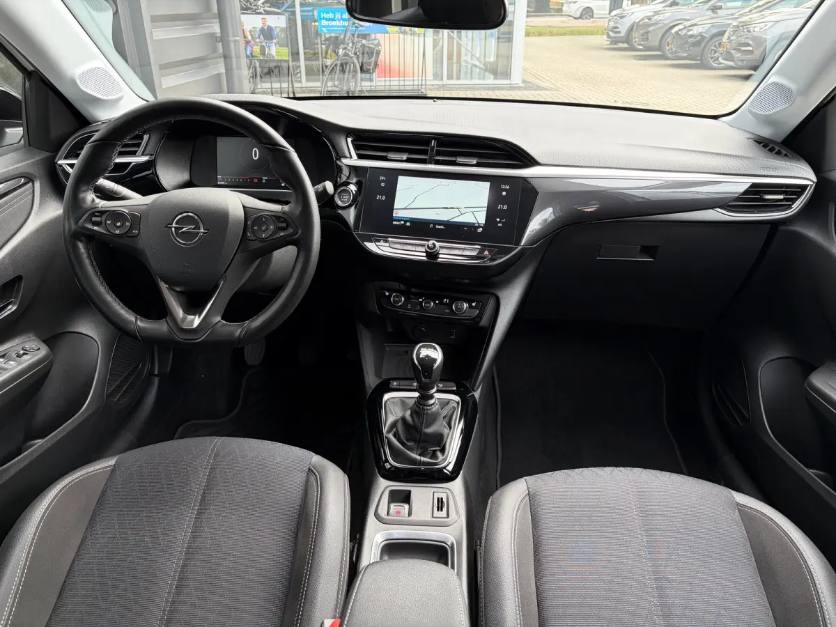1.2 100 PK Elegance | STUUR EN STOELVERWARMING| DODEHOEK DETECTIE| KEYLESS ENTRY & START| NAVIGATIE + APPLE CARPLAY/ANDROID AUTO| CAMERA + PARKEERSENSOREN| FULL LED| EERSTE EIGENAAR| DEALER 