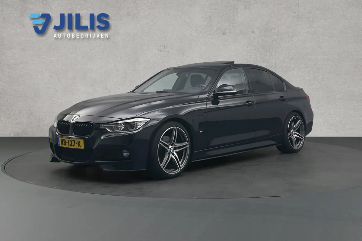 330e Centennial M-sport | Camera | Lederen bekleding | Schuif-/kanteldak