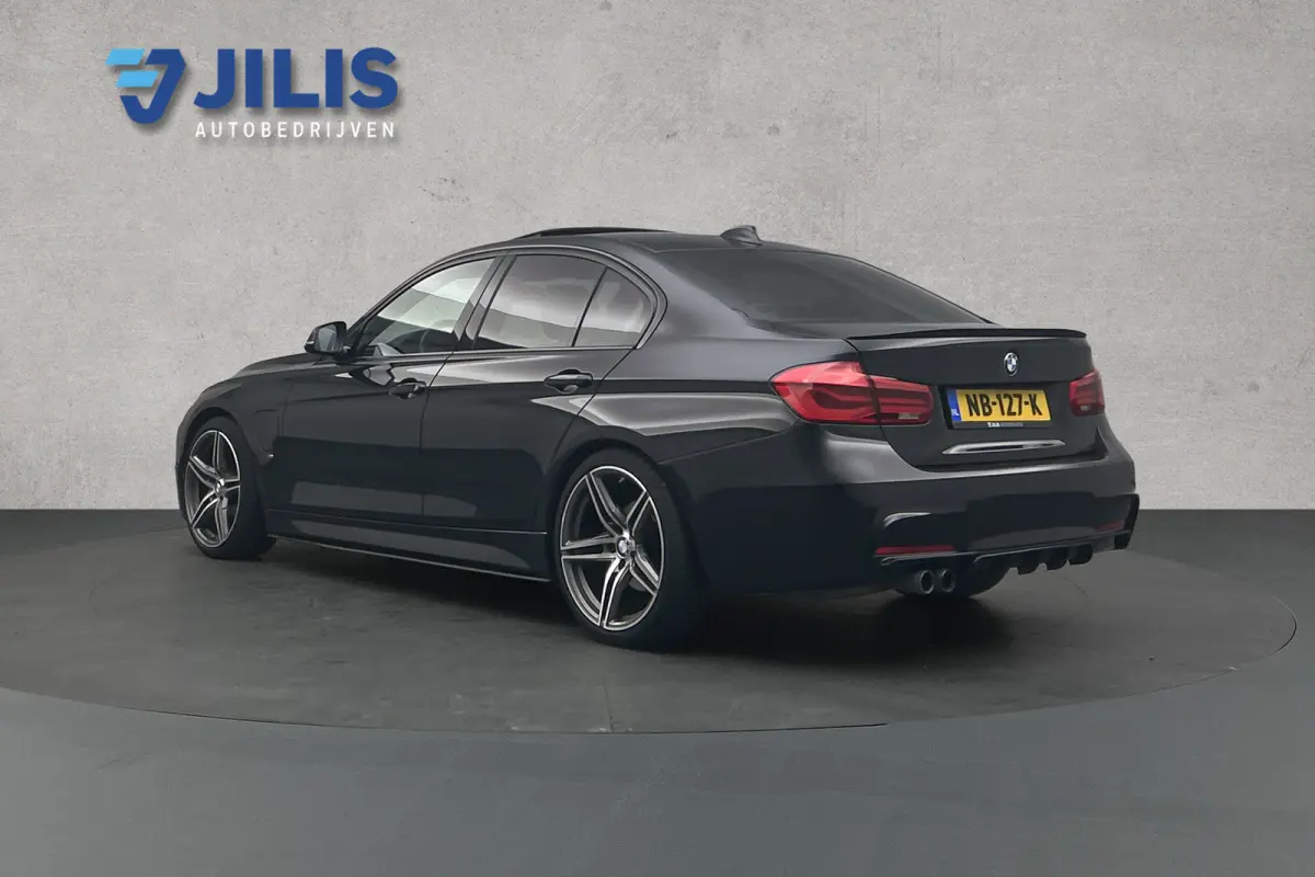 330e Centennial M-sport | Camera | Lederen bekleding | Schuif-/kanteldak