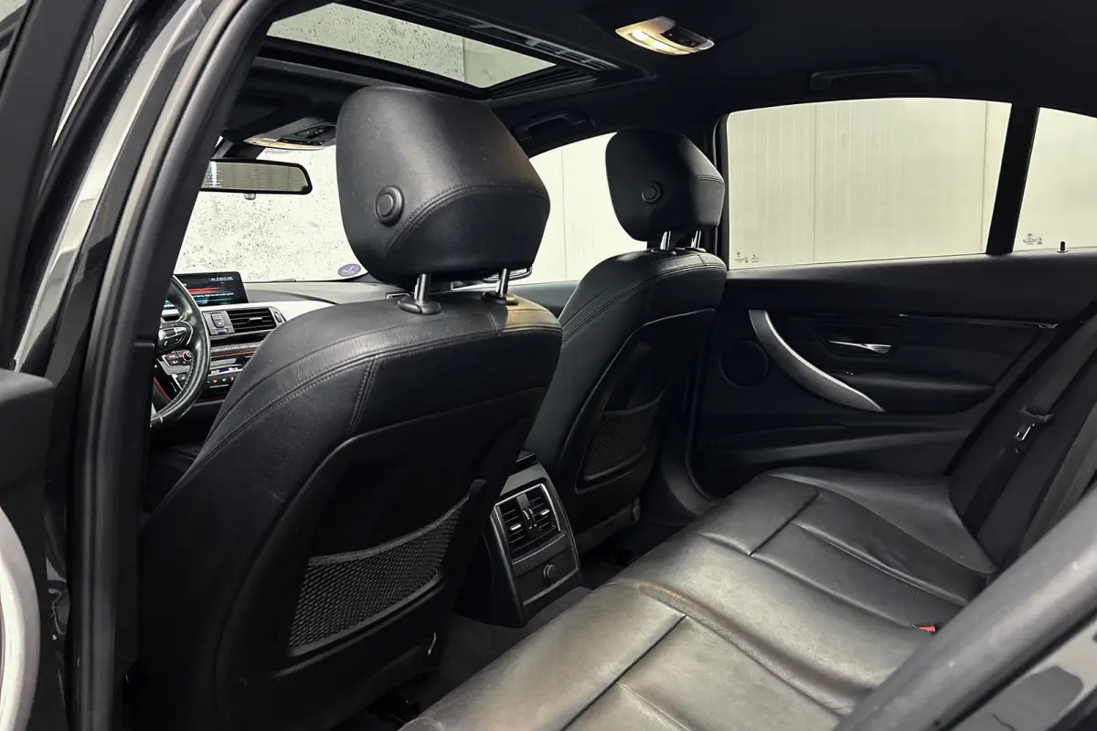 330e Centennial M-sport | Camera | Lederen bekleding | Schuif-/kanteldak